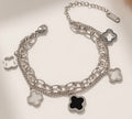 Double-chain bracelet with four-leaf clover charms