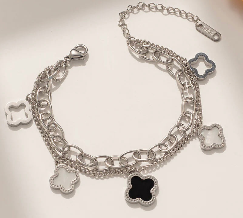 Double-chain bracelet with four-leaf clover charms
