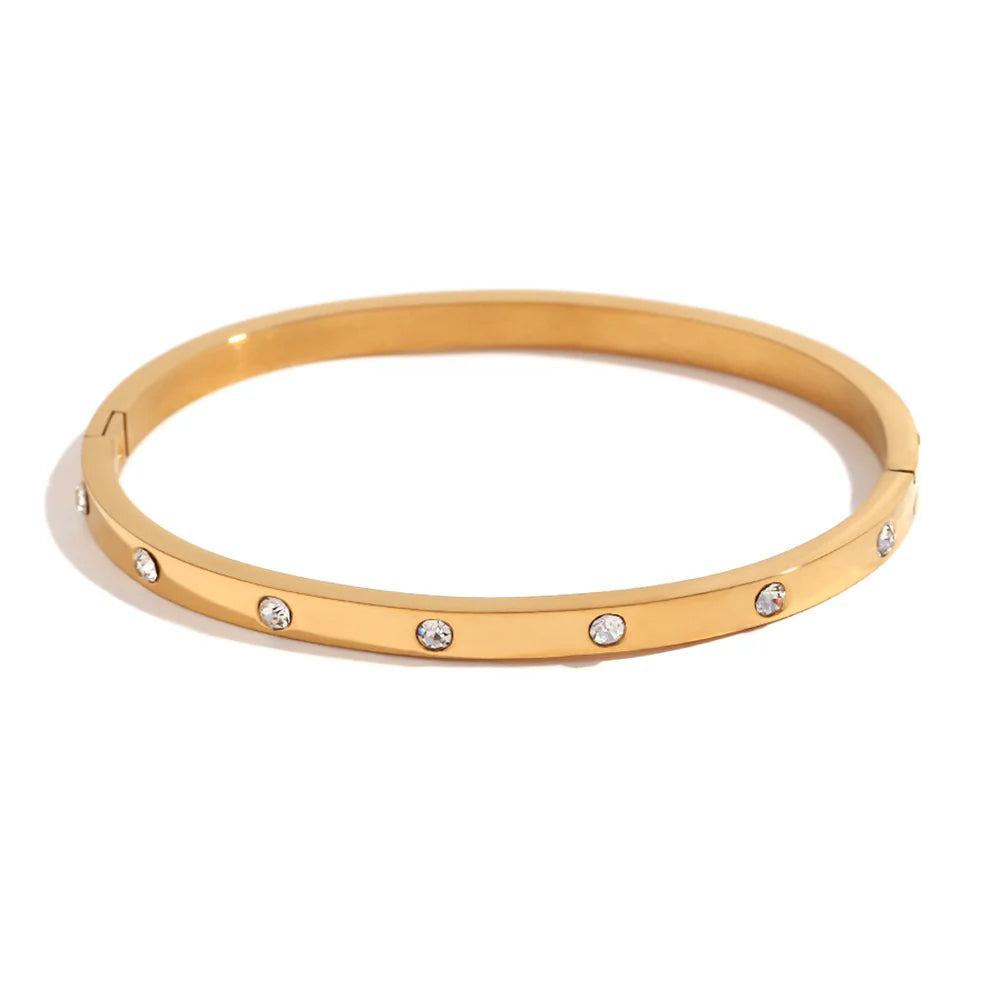 Rose-gold bangle bracelet with zirconia accents