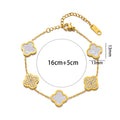Gold bracelet with rhinestone four-leaf clover charms